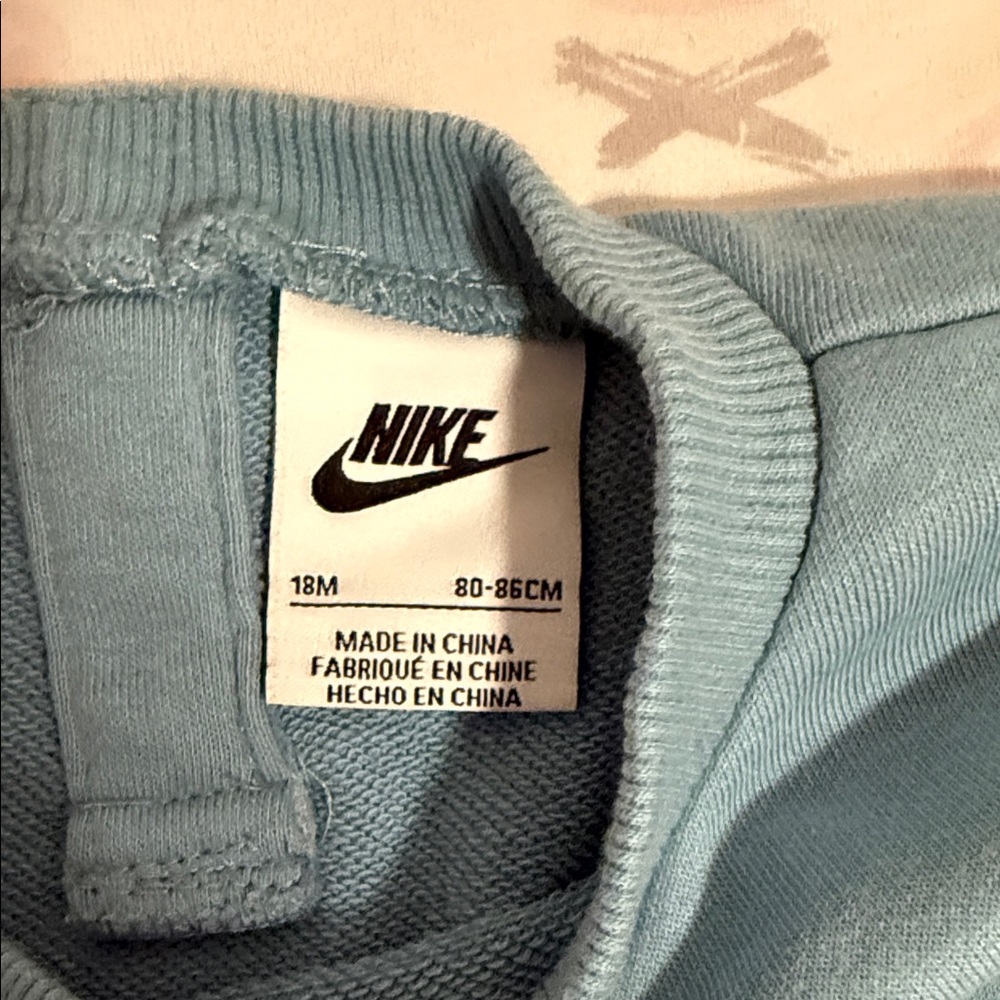Nike Kids Teal and Black Floral Leggings - Picture 4 of 4